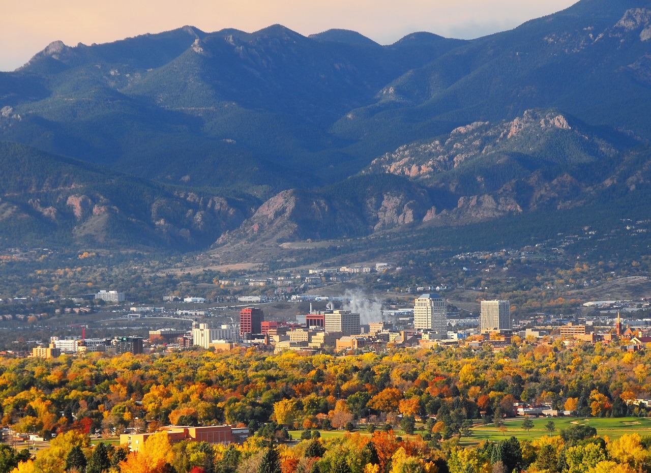 Downtown Colorado Springs skyline with autumn foliage and the Front Range