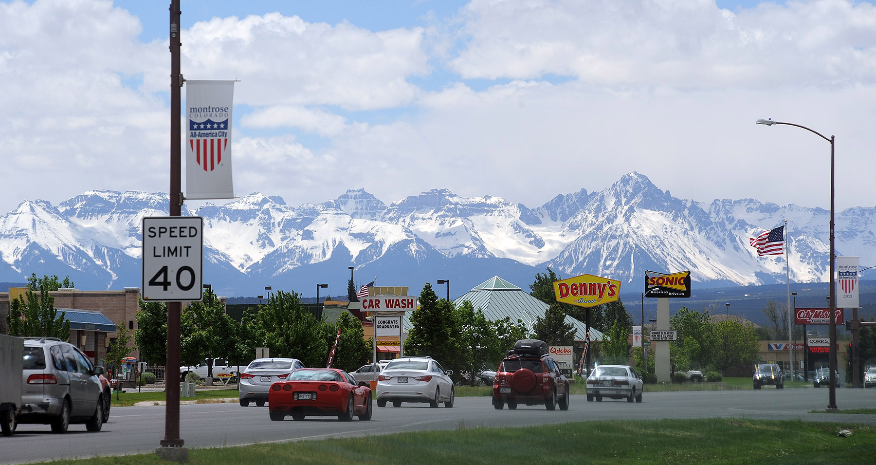 South Townsend Avenue in Montrose, Colorado with the San Juan Mountains in the background