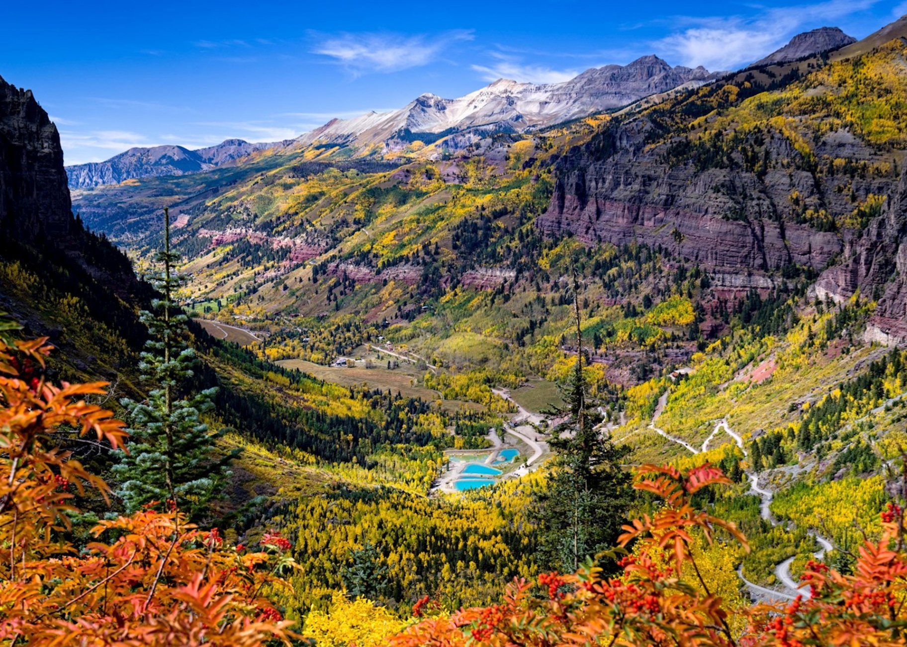 Telluride valley with autumn aspen trees and mountain peaks