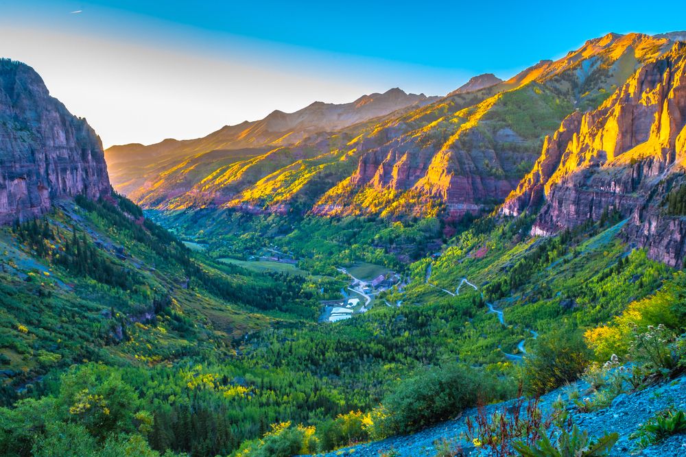 Sunset over the box canyon and Telluride valley with autumn aspens